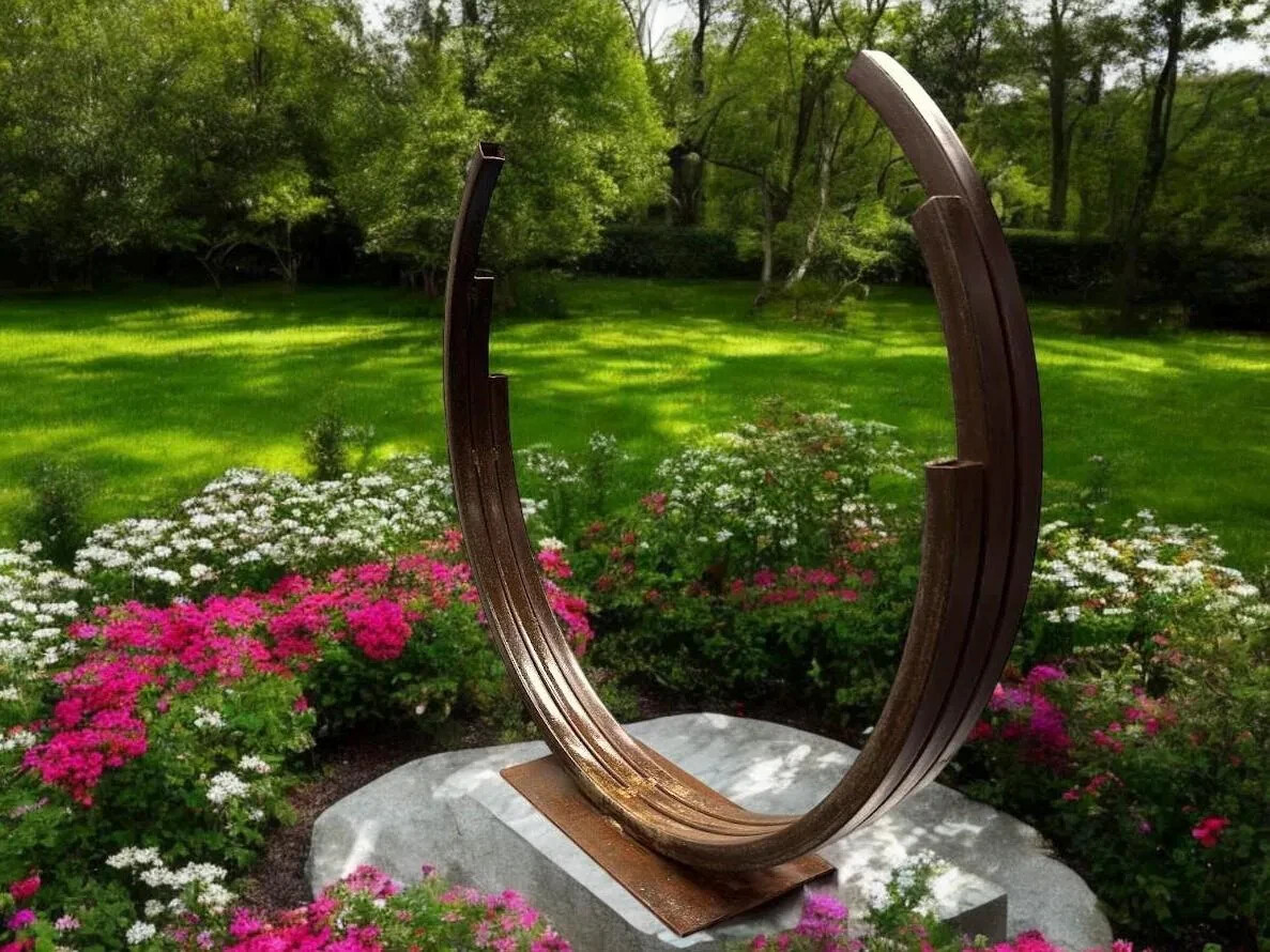 combining fire pits with metal art